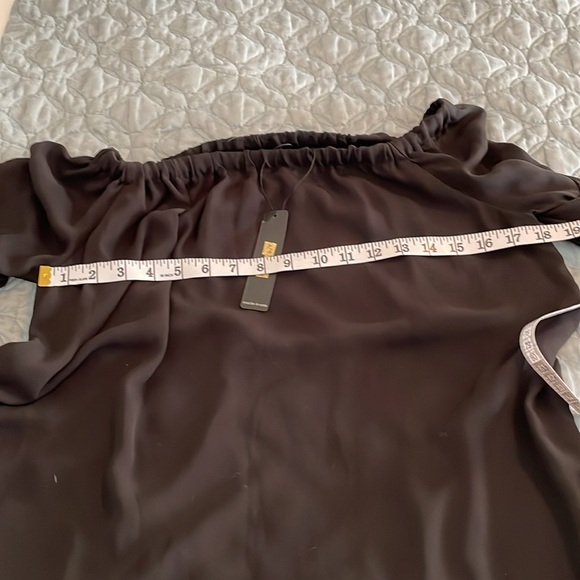 Krista black top with flutter sleeves and WT size large - Picture 8 of 9